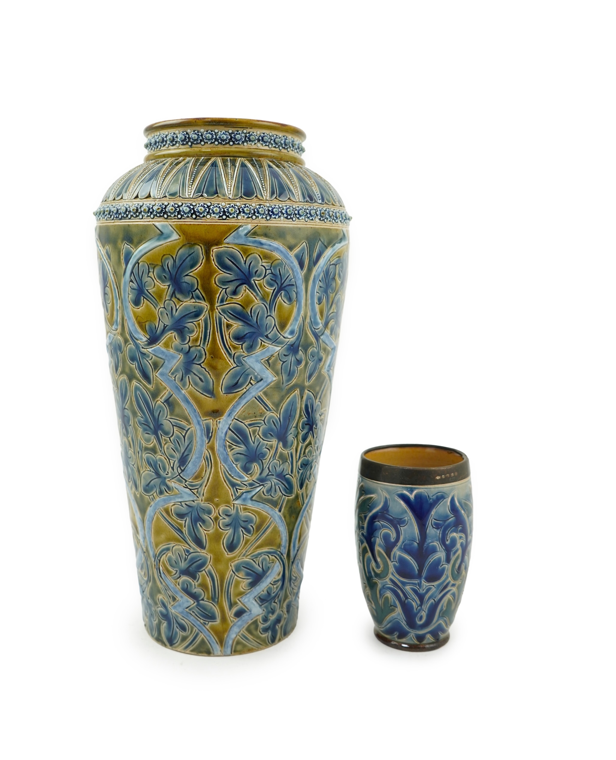 A Doulton Edith Lupton stoneware vase, drill hole to base, together with a similar Martha Rogers silver mounted cup, Tallest 31cm